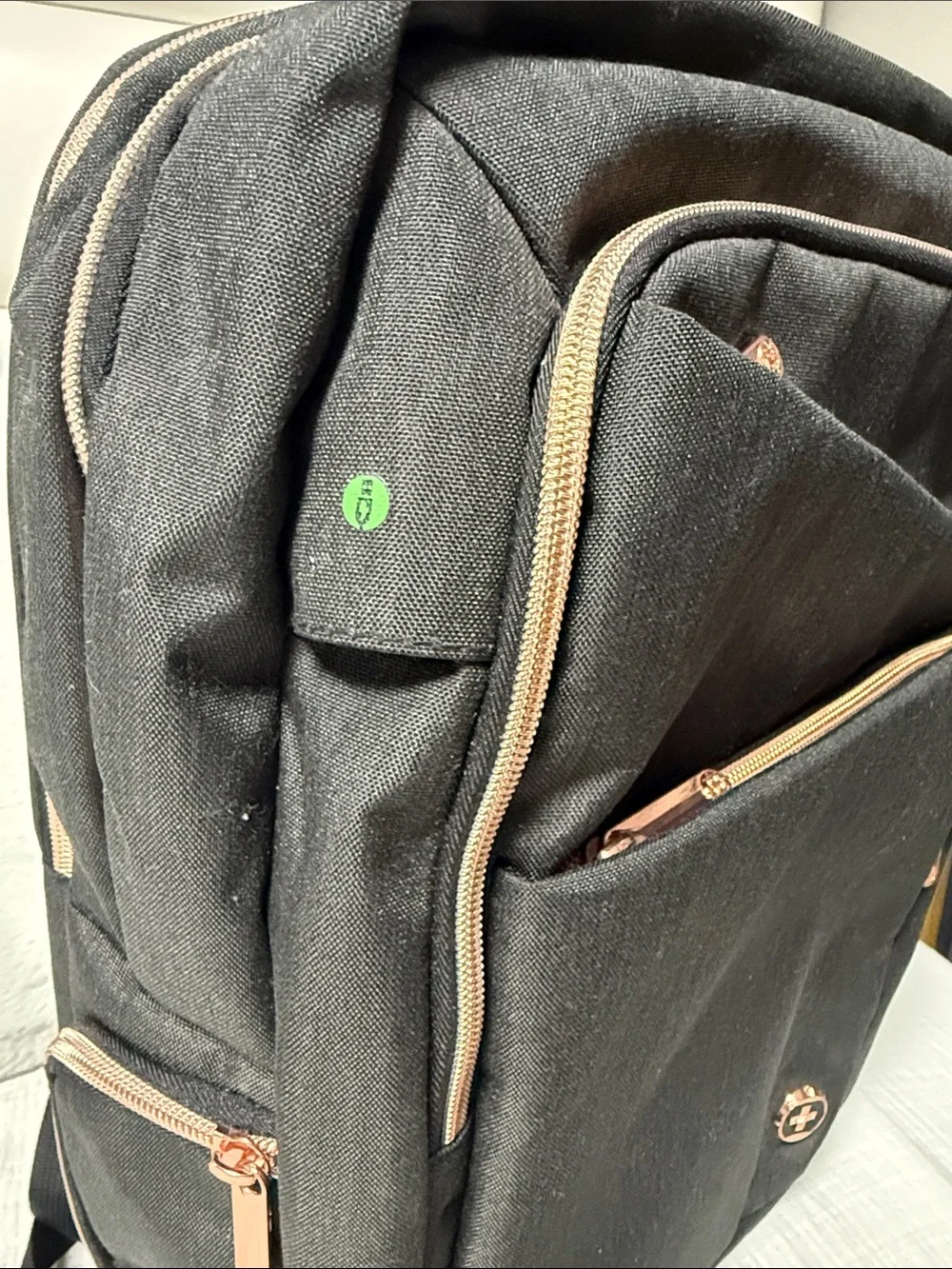 Used Black women Backpack with Rose Gold Accents